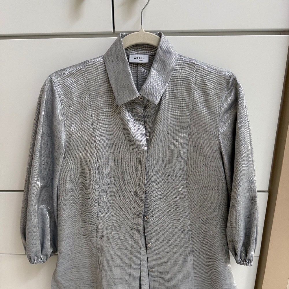 Woman’s shimmery blouse by Akris Punto size 6